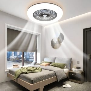 Modern bedroom with a round ceiling fan and built‑in light dispersing air over a neatly made bed; city skyline outside the window.